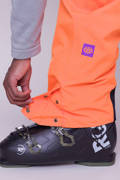 Spodnie snowboardowe 686 Exploration Bib (nasa orange black)